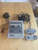 Console Super Nintendo avec jeu et accessoires bon état