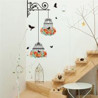Sticker mural Oiseau en cage et fleur
