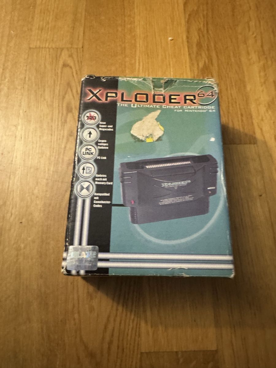 Nintendo Spiele: Xploder n64 cheat cartdridge + code book – Gebraucht aus Ostermundigen von RetroOwl