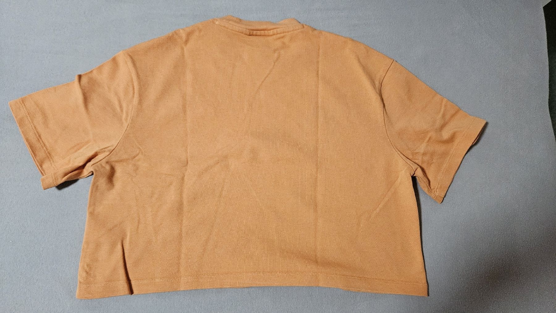 Nike T-shirt: Oranges Nike croptop – Usato da Sax venduto da Kieselstei 2
