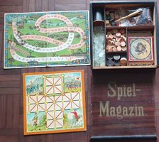 Antikes Spielmagazin mit diversen Spielen