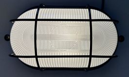 Wand.-Deckenleuchte oval schwarz E27, 230V occ.