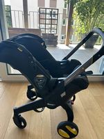 Poussette / siège auto Doona en excellent état