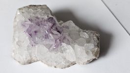 Natural amethyst and quartz crystal cluster on matrix.