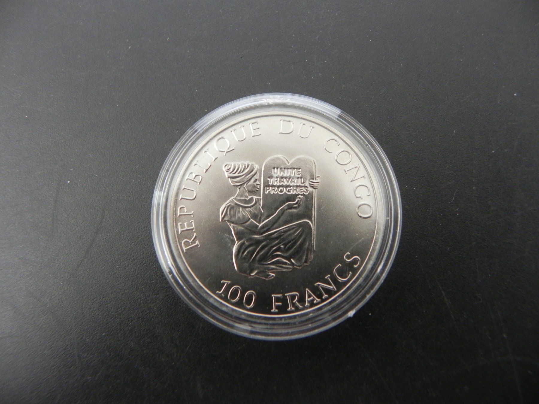 Tutti le monete: Congo 100 Dollars 1995 - Junkers JU 52 – Usato da Biel/Bienne venduto da Gogolozi 1
