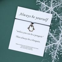 Armband mit herizgem Pinguin Anhänger (Geschenk)