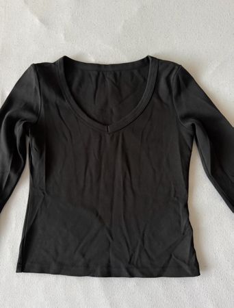 Schwarze Baumwoll Langarmshirt