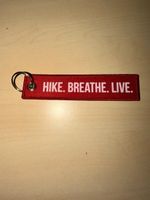 Lot 10x porte-clés brodés"Swiss Traveller/Hike.Breathe.Live"