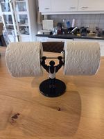 Porte-papier toilette haltérophile