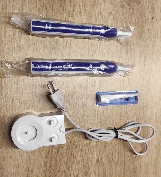 Zwei OralB Pulsonic Zahnbürsten + Ladegerät Kaufen auf Ricardo
