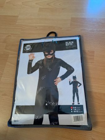 Déguisement neuf Black Kitty taille 116-122