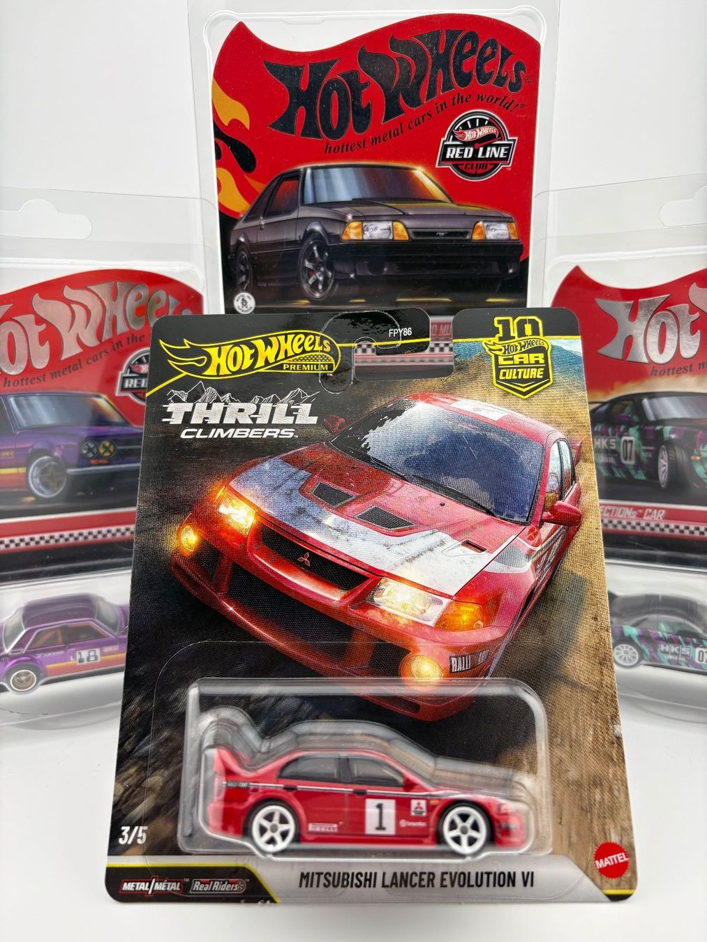 Hot Wheels Modellini d'auto: Hot Wheels Mitsubishi Lancer Evolution VI Thrill Climbers – Nuovo e nell'imballaggio originale da Flawil venduto da HeisseReifen