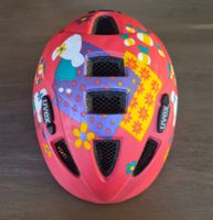 Kinderhelm Uvex pink Blumenmotiv