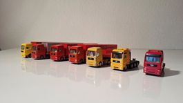 Siku: 7 MAN LKW's, inkl. 2 4-Achser Schlepper