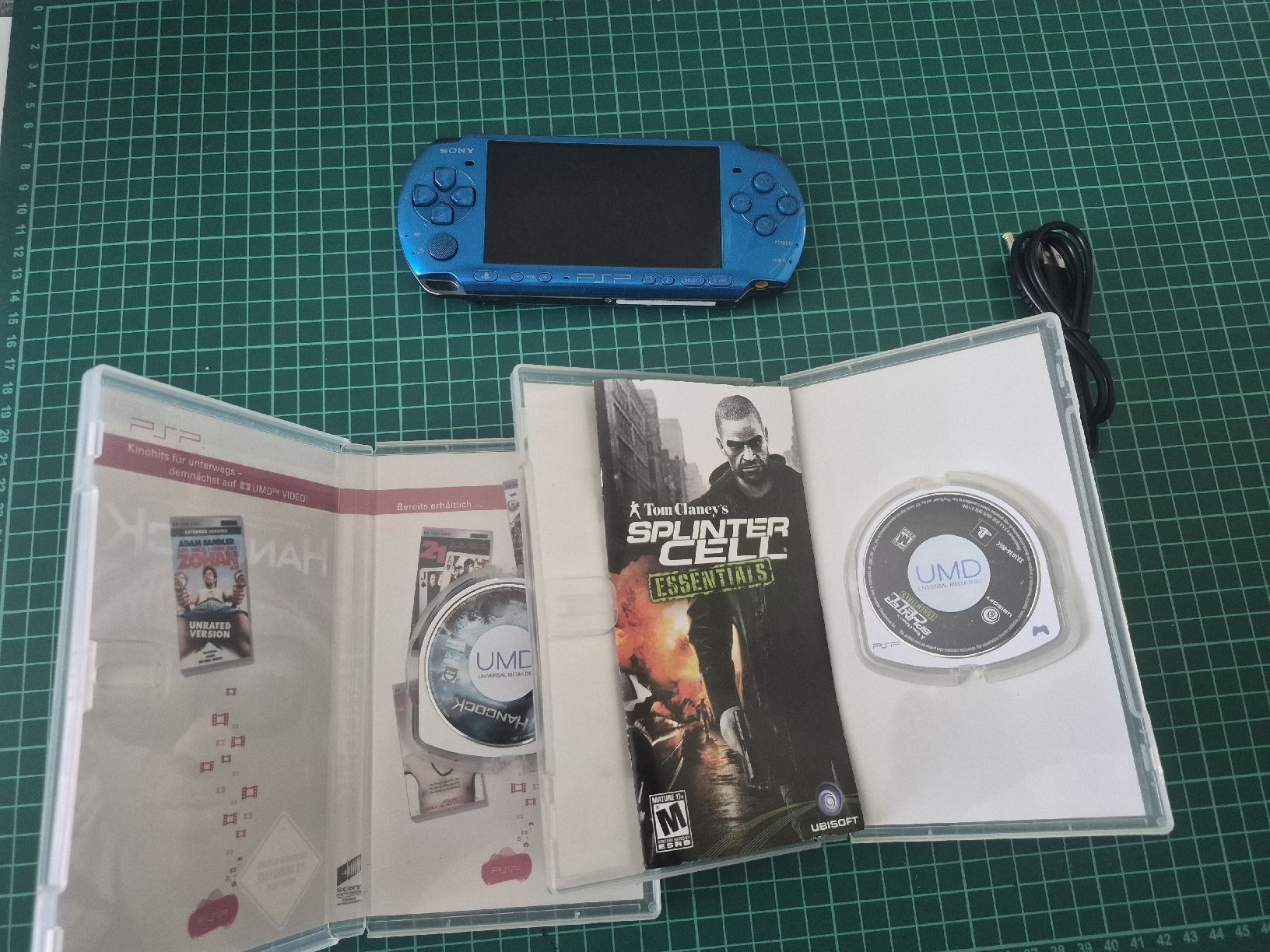 Sony Konsolen: Sony PSP blau mit Spielen Hancock und Splinter Cell – Gebraucht aus Meyrin von Retro-GZ 1