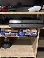 PS4 + jeux + 4 manettes