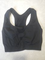 Brassière de sport  noir taille L neuve