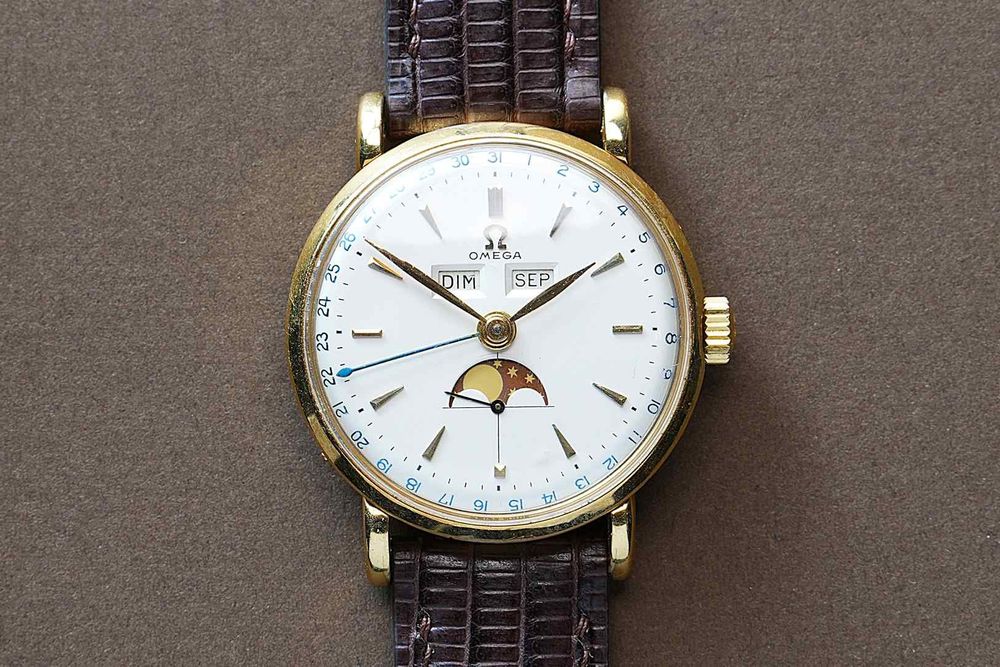 Omega Cosmic Triple Calendar in 18k gold Kaufen auf Ricardo