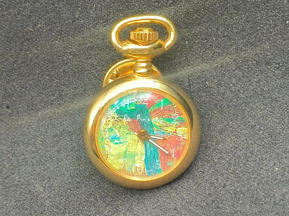 Montres: Pin's Oly – D'occasion à La Chaux-de-Fonds par curtitswisswatches