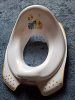 Réducteur pour les toilettes