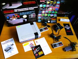 NES: Console + Boîte + Manuel + câbles élect/TV + 2 manettes