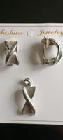 Silver Tone Jewelry Set: Clips and Pendant - Stylish!