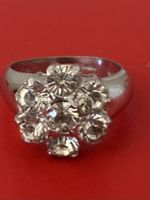 Magnifique bague marguerite en argent et zircons