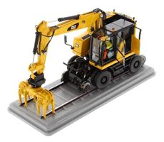 1:50 CAT M323F Schinenbagger gelb