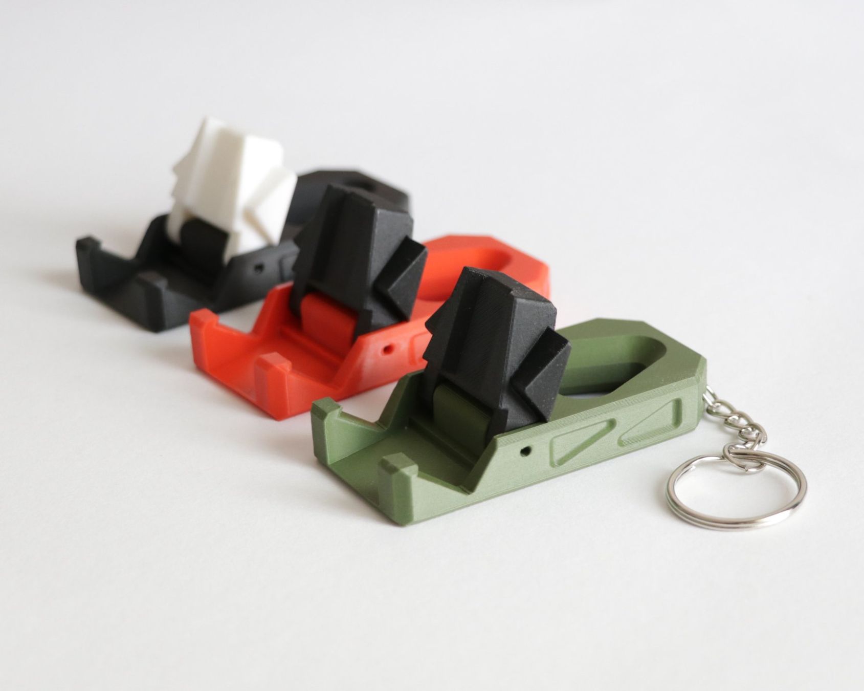 Staffe: Handyhalter Schlüsselanhänger Klappbar – Nuovo e nell'imballaggio originale da Winterthur venduto da Printfusion 1