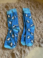 Lustige Pinguinsocken zu verkaufen