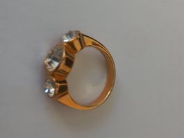Fingerring vergoldet mit 3 weissen Steinen  G 19/60
