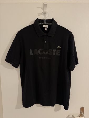 Schwarzes Lacoste Poloshirt, Grösse M aber fit L, Top