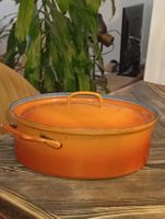 Gusseisen Bräter oval orange 28 cm mit Deckel gebraucht.