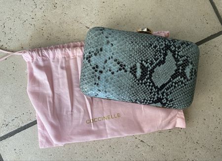 Elegante Coccinelle Clutch, neuwertig!