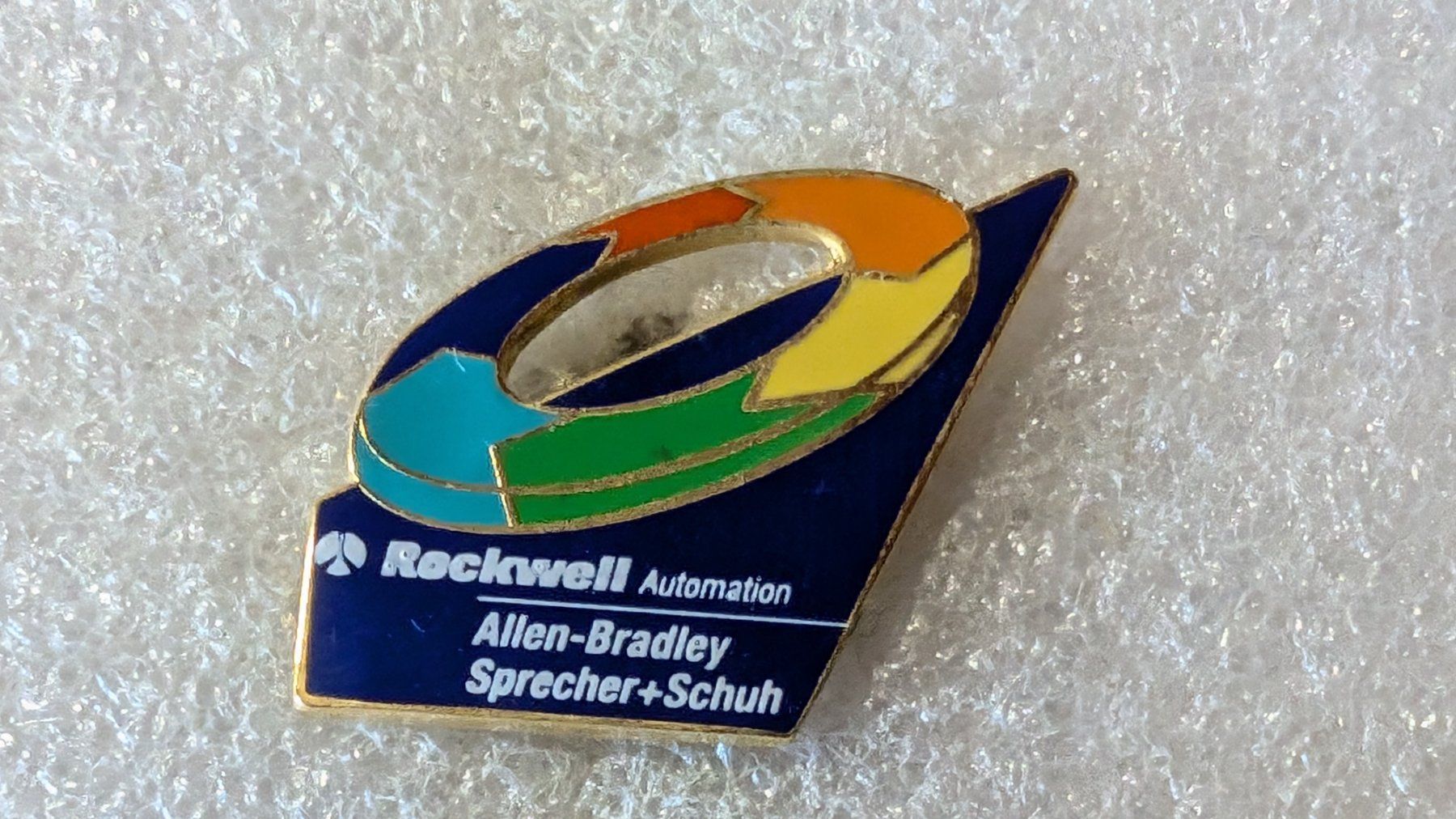 Placchette & Badge: Ansteckpin 212: Rockwell – Usato da Oppligen venduto da Pin-Fall-Shop