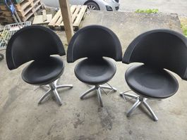 drei Friseurstühle