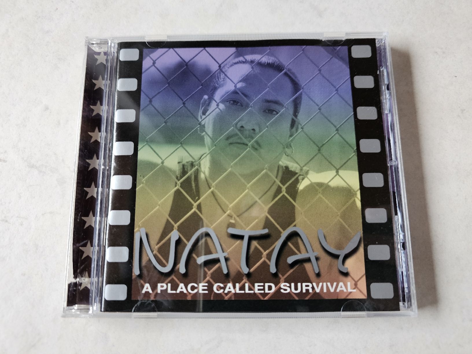CD: Natay  -  A Place Called Survival – Usato da Schneisingen venduto da backstore24