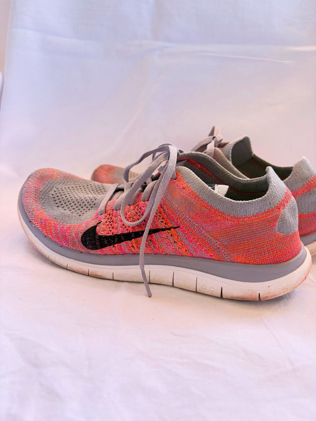 Nike Scarpe da donna: Nike Free 4.0 Flyknit Gr. 39 grau/orange – Usato da Neuendorf venduto da jas_j5nc