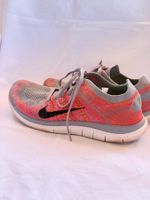 Nike Free 4.0 Flyknit Gr. 39 grau/orange