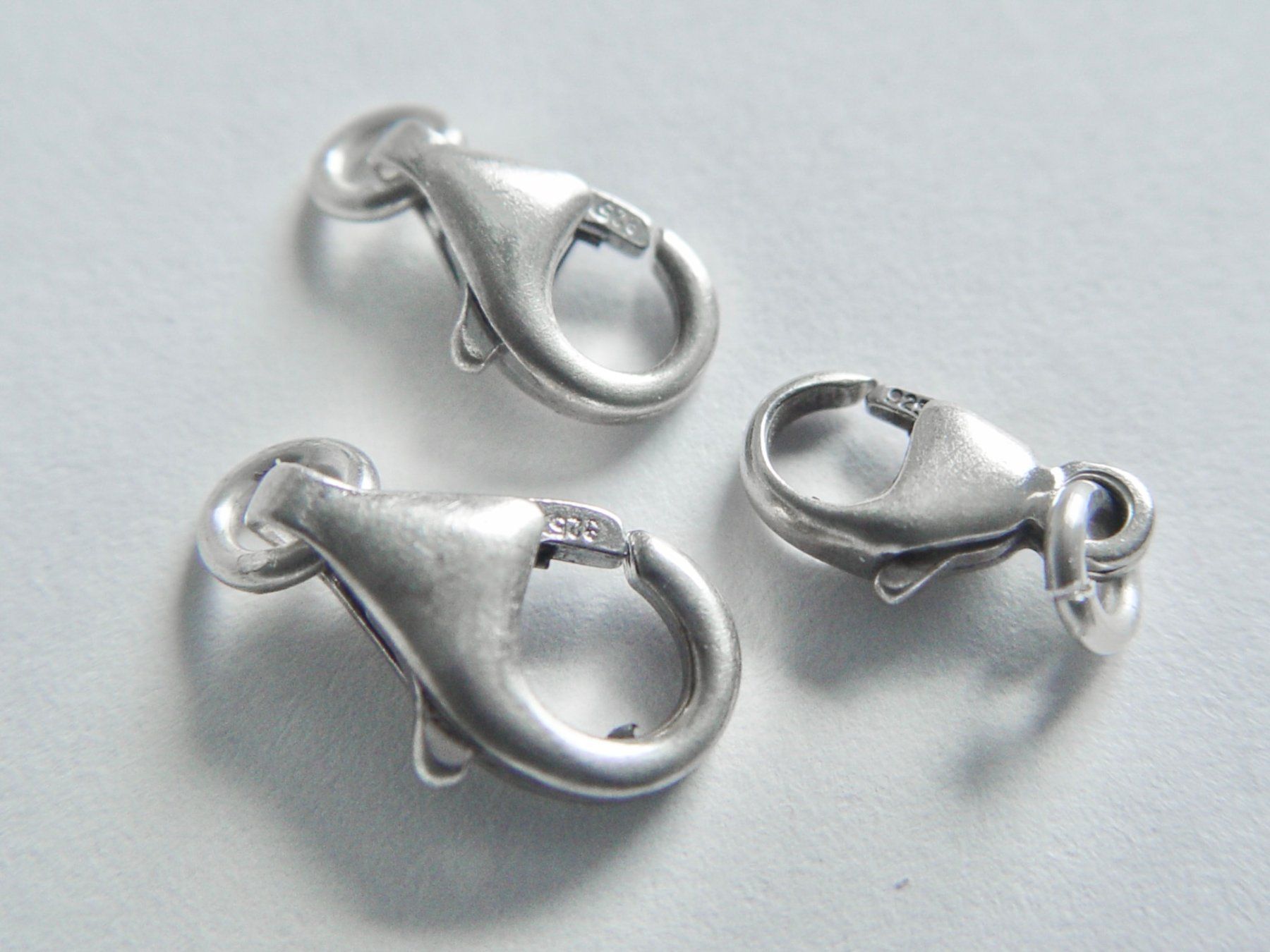 Perle (finte): 3 Karabiner Verschlüsse aus Silber – Usato da Henggart venduto da gernli