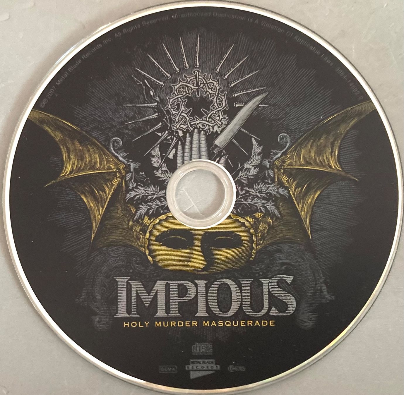 CD: IMPIOUS - HOLY MURDER MASQUERADE – Usato da Poliez-Pittet venduto da Newtown-Records 2