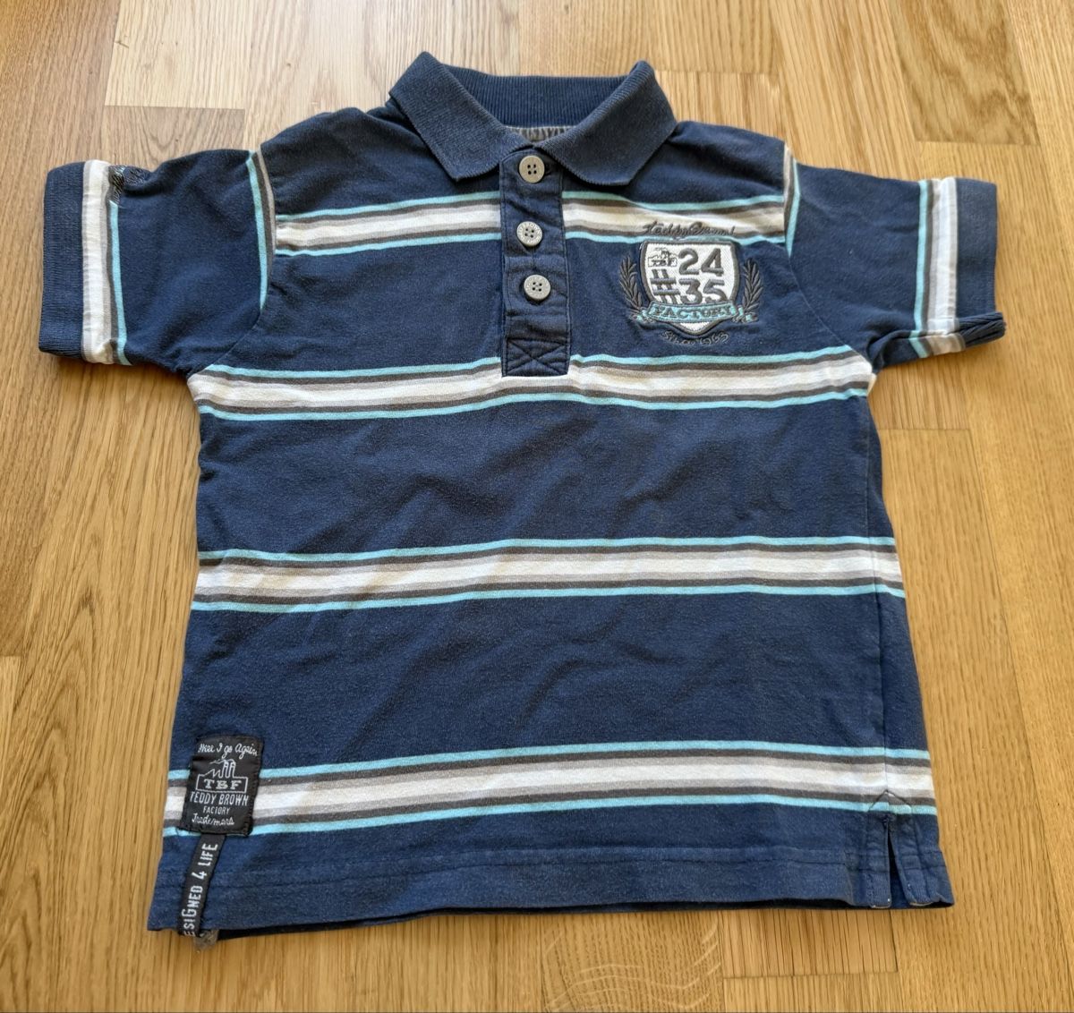 Camicie, T-shirt & Polo: Teddy Brown Factory - Polo rayé, taille 26 mois – Usato da Genève venduto da valmath