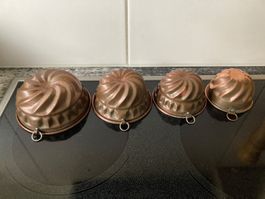 4 verschieden große Backformen aus Kupfer