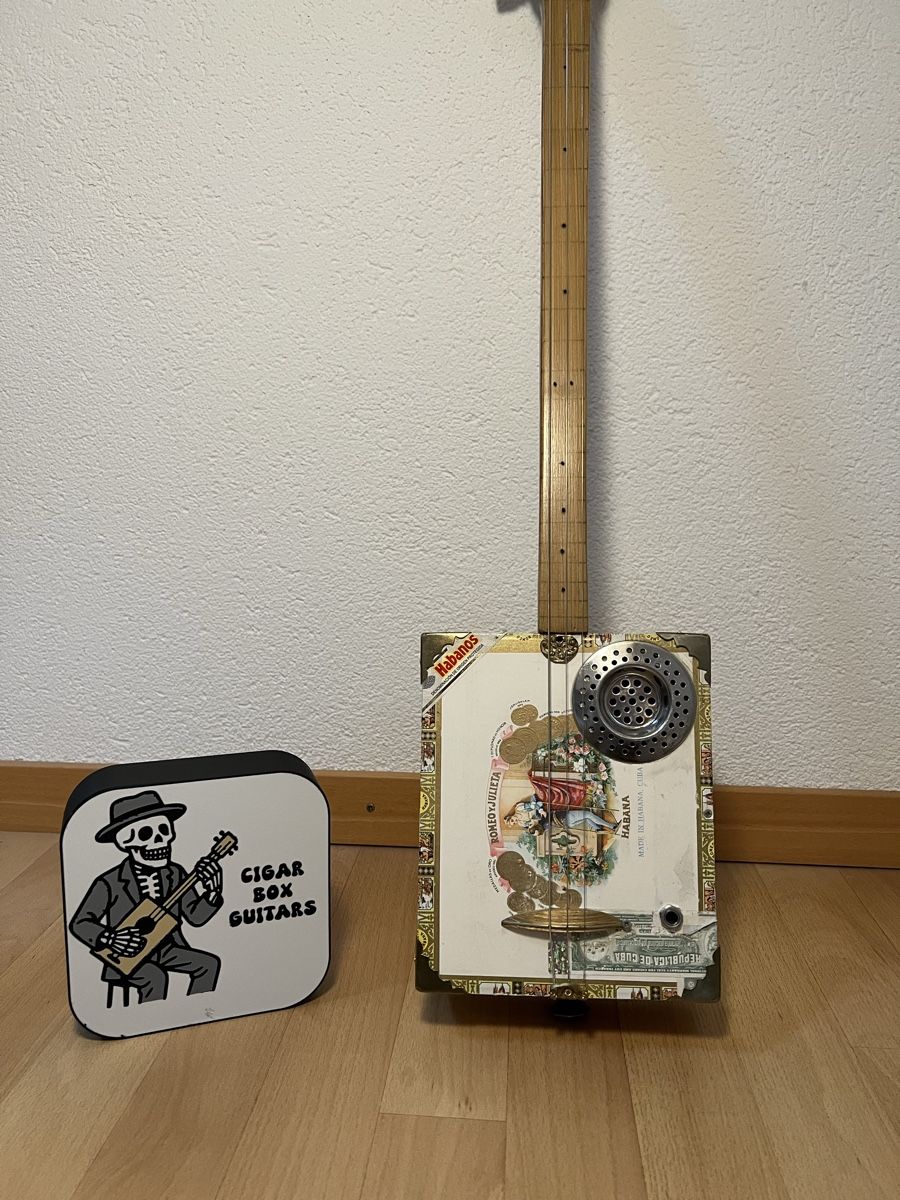 Strumenti musicali: Cigar box guitar – Usato da Corcelles NE venduto da Yabo