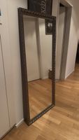 Mirror with ornate frame