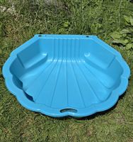 Sandkasten und Pool