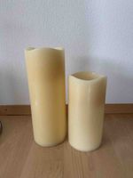 Zwei LED-Wachskerzen in verschiedenen Grossen