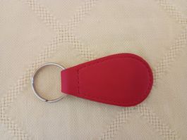 Schlüsselanhänger rot, oval, Leder, ca. 9 cm