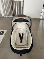 Joie Calmi R129 nacelle  comme neuve, avec habillage pluie