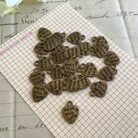 25 Anhanger Metall Made with Love Bronze Farbe Herz coeur